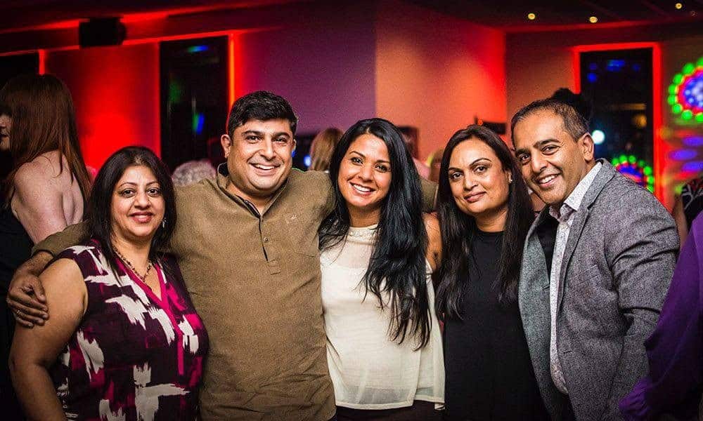Family and friends together at a birthday celebration